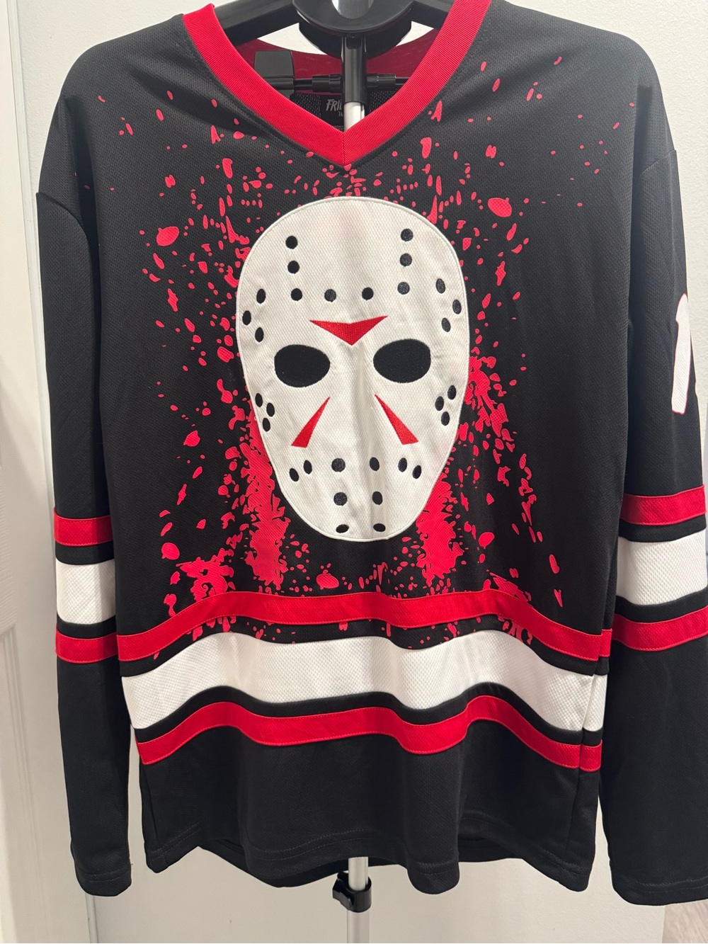 Friday the 13th Jason Voorhees Hockey Mask Pullover Jersey.  Halloween ready!